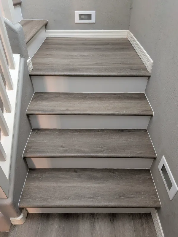 Finished LVP stairs with custom bullnose stair-nose detail in Mesa