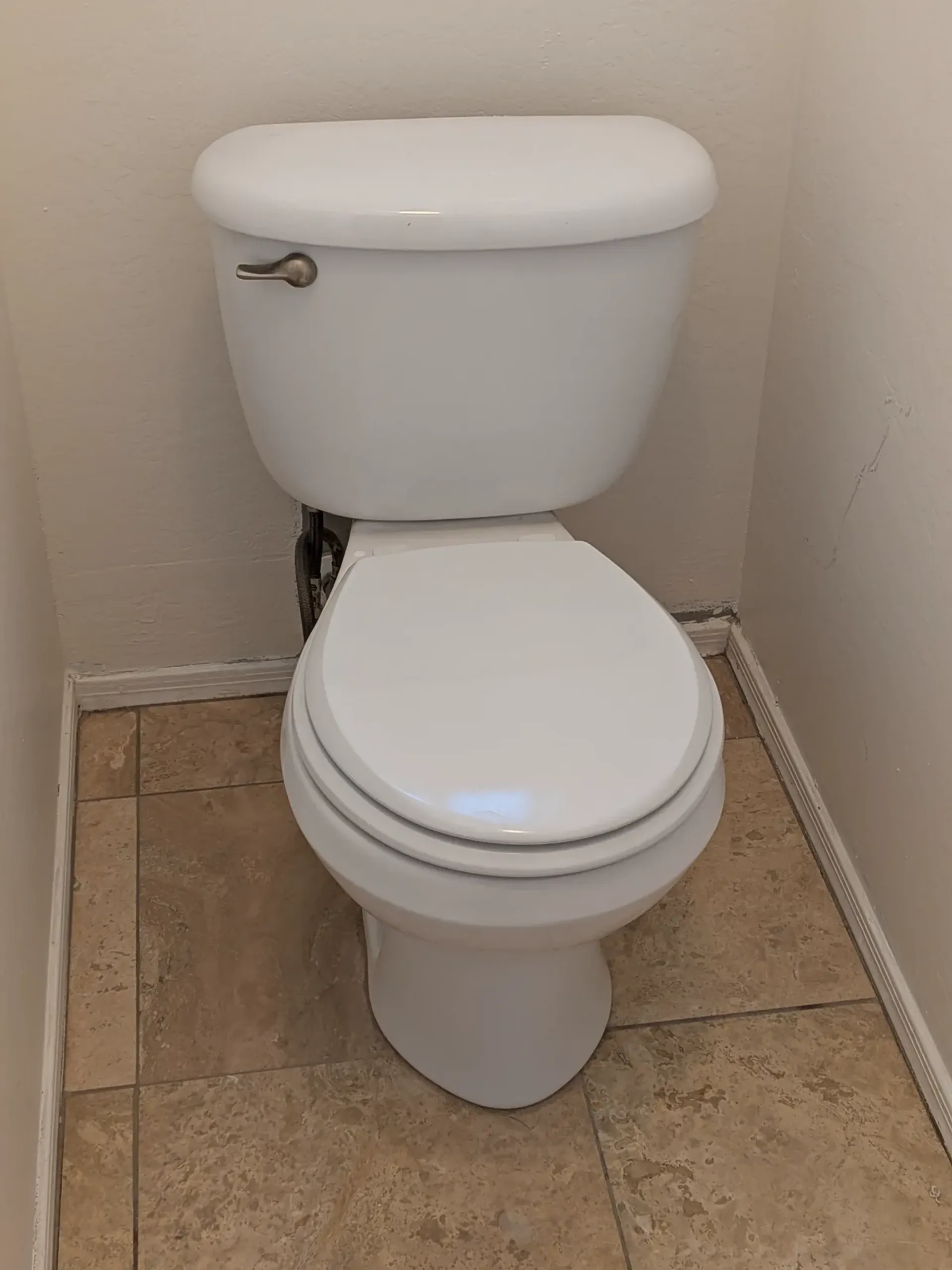 Completed toilet replacement in a Gilbert bathroom